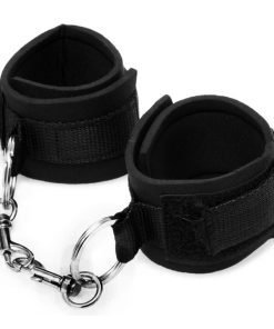 Black padded wrist restraints with a connecting chain