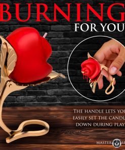 Red rose-shaped candle with a gold holder