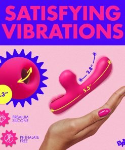 A pink silicone vibrator on a hand with measurements displayed
