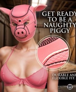 Woman wearing a pink pig mask and pink lingerie