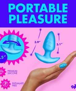 A hand holding a blue silicone pleasure device with dimensions labeled.