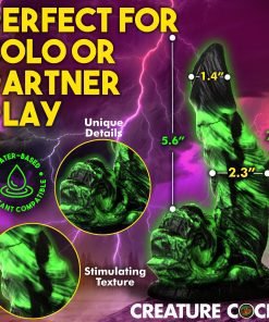 Vibrant green textured dildo designed for solo or partner use, featuring unique details and water-based lubricant compatibility.