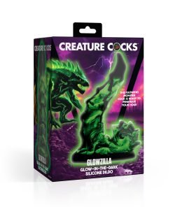 Glow-in-the-dark silicone dildo packaging featuring a monster design