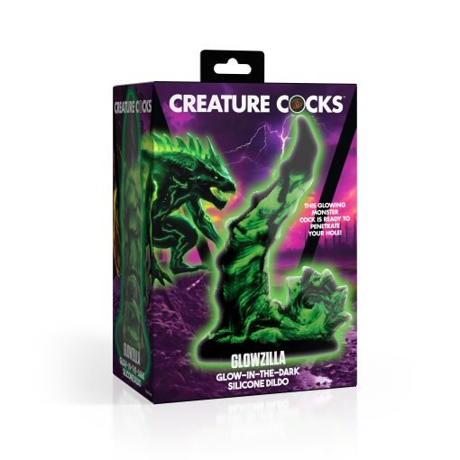 Glow-in-the-dark silicone dildo packaging featuring a monster design