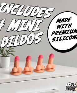 Four mini silicone dildos displayed on a table with a plant