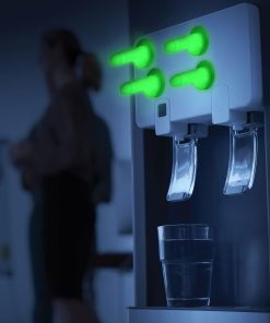 Modern water dispenser with illuminated buttons and a glass of water