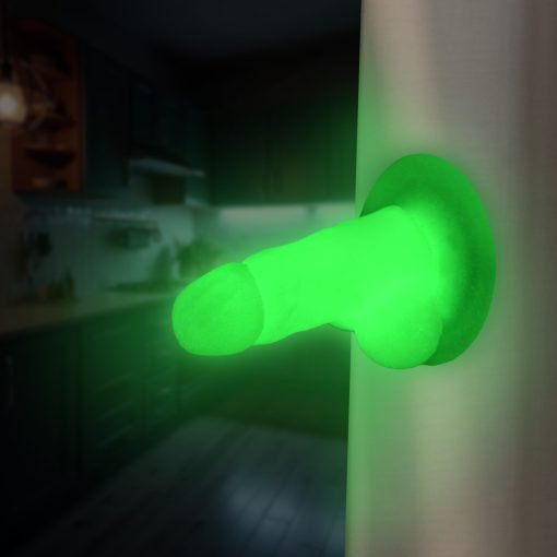 Glowing green novelty door handle in a kitchen setting