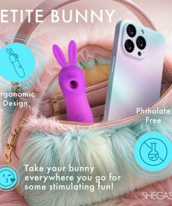 A purple bunny-shaped vibrator inside a stylish fluffy bag next to a smartphone.