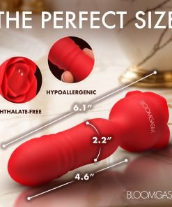 Red vibrator with a floral design, showcasing its size and features