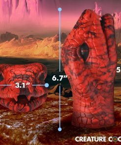 Red creature-themed toy displayed in a fantastical landscape