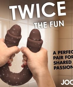 Two novelty items held in hands in a shower setting