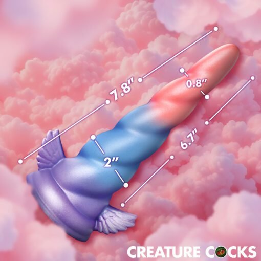 Colorful unicorn-themed toy with measurements against a pink cloud background
