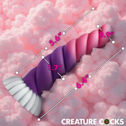 Colorful twisted toy against a fluffy pink background