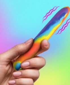 Colorful handheld vibrator against a gradient background