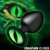 A unique black plug with a green dragon eye design