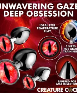Collection of black anal plugs with eye designs, featuring various sizes and temperature play options.