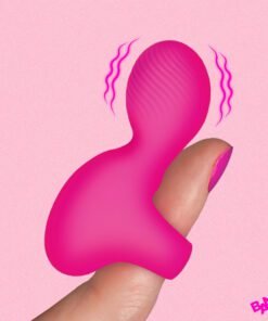 Vibrating pink silicone toy held between fingers