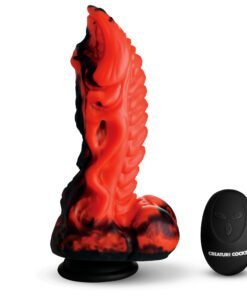 Vibrant red and black silicone toy with a remote control, ideal for adult play.
