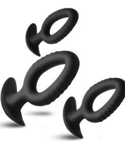 Three black silicone butt plugs of varying sizes on a white background.