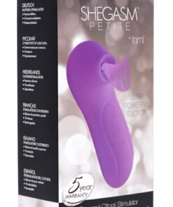 Shegasm Petite Clitoral Stimulator packaging with a purple design and details in multiple languages.