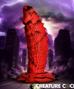 A vibrant red and black textured novelty item set against a dramatic stormy background.